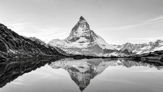 Black and white Matterhorn mountain banner for the VVC × Glacier Sport Zermatt handmade B2B gift story, connecting Crete, Zermatt and Mediterranean design.