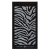 Open display view of Greenwich Polo Club black zebra beach towel 3604 on luxury yacht in Dubai beach club setting