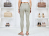 Back view of 3D Denim Griullo grey-olive laminated slim-fit trousers showing the rear pockets and fitted legs.