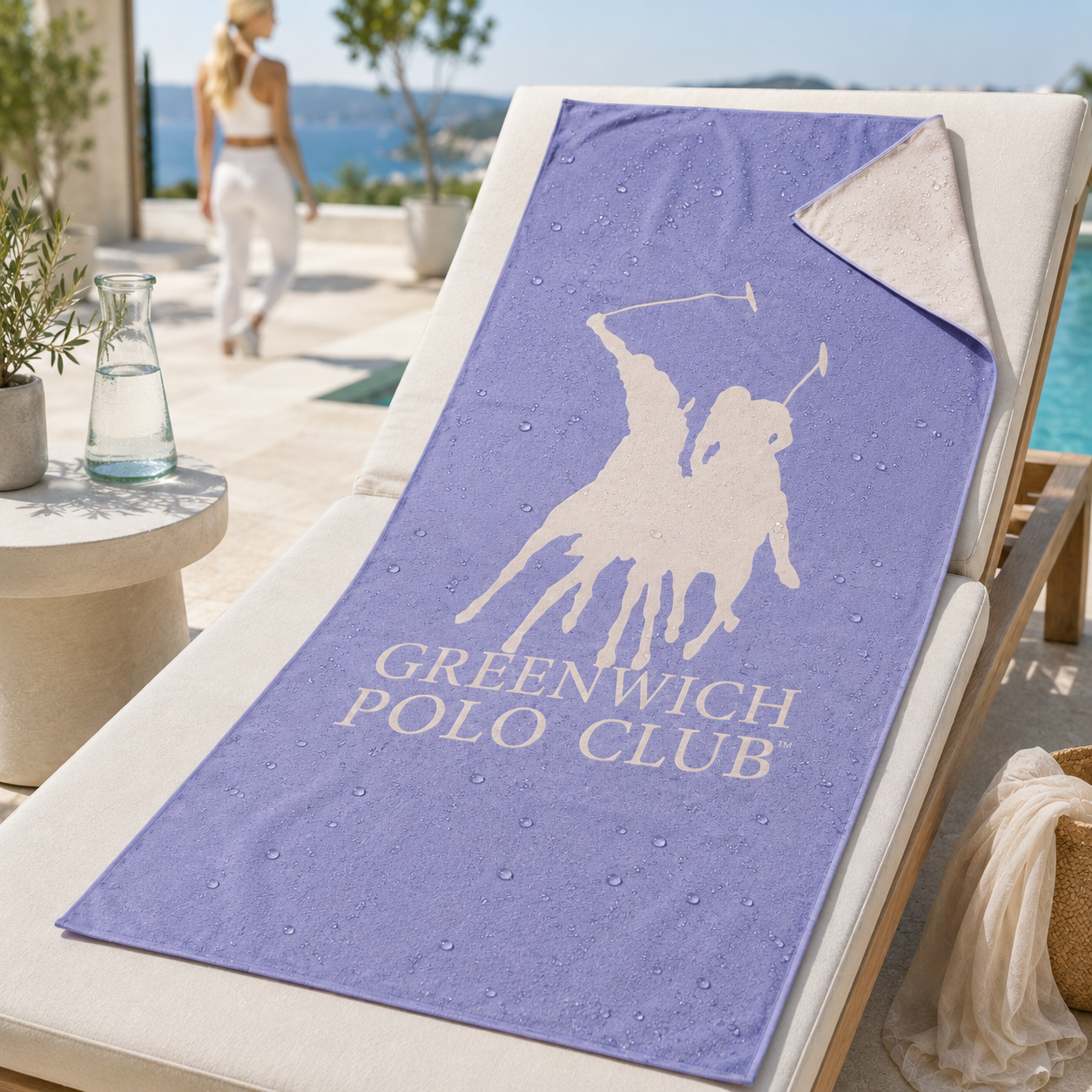 Greenwich Polo Club microfiber beach towel 5215 in lavender and cream on poolside sun lounger in Crete, fast drying towel available at VVC shop Sitia