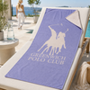 Greenwich Polo Club microfiber beach towel 5215 in lavender and cream on poolside sun lounger in Crete, fast drying towel available at VVC shop Sitia
