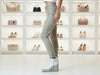 Side view of 3D Denim Griullo grey-olive laminated slim-fit trousers showing the slim leg and laminated finish.