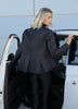 Back view of black and dark blue diamond quilt puffer jacket women’s jacket by VVC, featuring a fan-shaped collar and tailored fit, made in Greece.