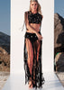 Front view of macramé River halter top black with fringes, shells, and sequins, handmade by ZOE, exclusive at VVC Sitia.
