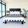 Modern bedroom black and white bedding with black tassels