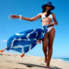 Boho-inspired blue and white scarf with orange fringes styled as a beach pareo, ideal for batik lovers, Sitia Crete