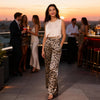 Choklate leopard print wide leg pants with elastic waistband, trendy and comfortable design.