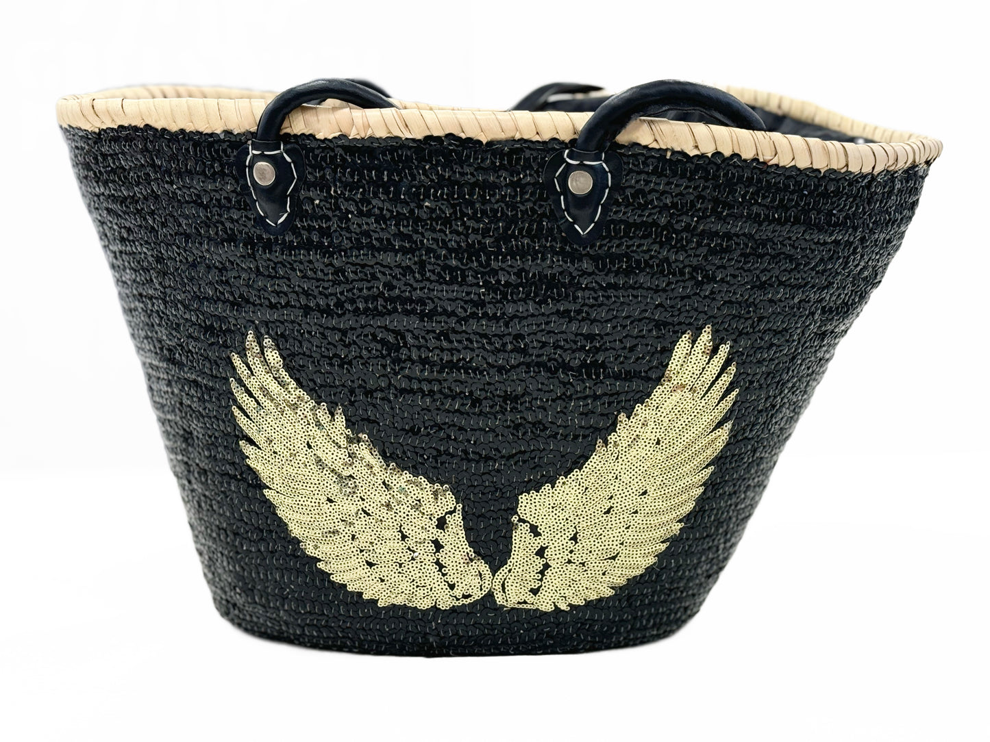 Large handmade black raffia beach and shopping basket with sparkling black sequins and gold angel wings, leather handles and drawstring liner, front view on white background, available at VVC Shop Sitia, Crete.
