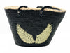 Large handmade black raffia beach and shopping basket with sparkling black sequins and gold angel wings, leather handles and drawstring liner, front view on white background, available at VVC Shop Sitia, Crete.