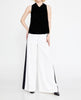 Women’s high-waisted long-leg trousers with flowing fabric and black stripe
