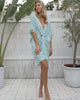 VVC Playful Boho Top front view, Turquiase zebra pompoms, multi-purpose beach cover-up