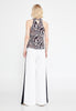 Wide-leg silhouette trousers paired with waterfall neck top