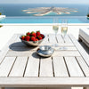 Small 12 cm hammered aluminum wind-proof ashtray on a home patio table
