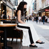 Coordinated women’s outfit wide-leg trousers and zebra top
