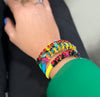 Close-up of a wrist wearing colourful ART WEAR Dimitriadis statement bracelets at VVC SHOP Sitia.