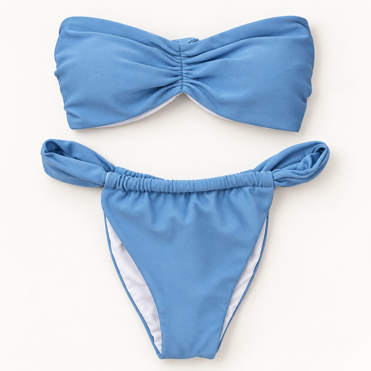 Baby blue bandeau bikini with gathered top and adjustable Brazilian-cut bottoms shown flat, VVC Swimwear Sitia Crete.
