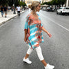 Side of coral turquoise tunica, lightweight and slightly sheer, crochet edges, belted or loose, beach cover-up, available in Sitia