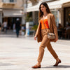 Berrin bandeau bustier in bright orange with a beige skirt, feminine resort wear look for women at VVC SHOP Sitia