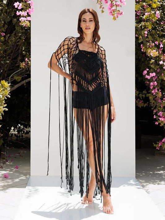 Front view of a long black cotton crochet cover-up with macramé details, styled as a breathable festival and beach party outfit.
