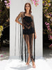 Front view of a long black cotton crochet cover-up with macramé details, styled as a breathable festival and beach party outfit.