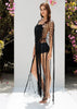 Lightweight black crochet cover-up styled for a foam party, made from breathable cotton with decorative macramé details.