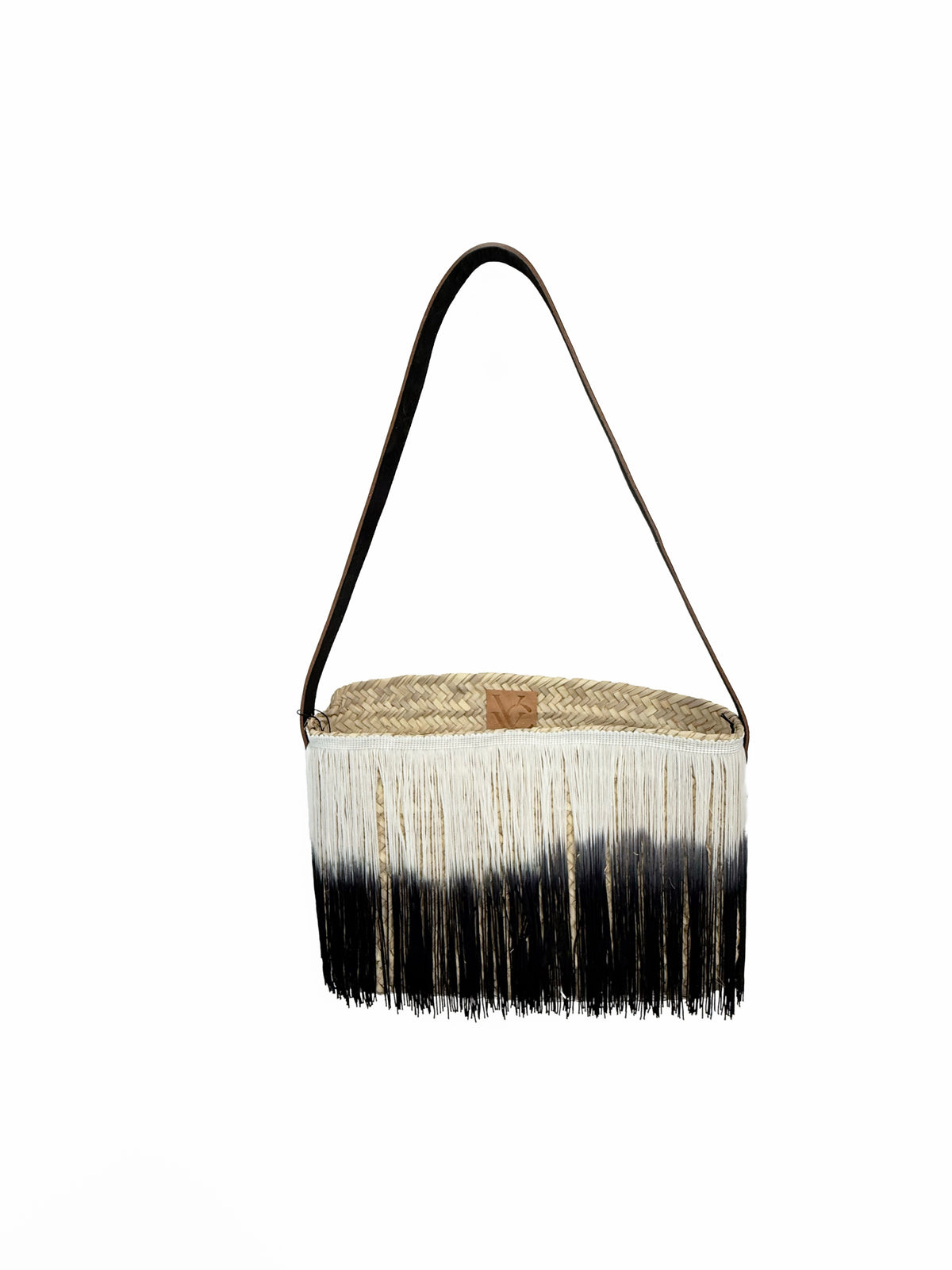 Black and white ombré raffia fringe shoulder bag by VVC with leather strap, front view on white background