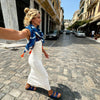 Close-up of blue and white batik pattern on fringed scarf, Boho chic design, available in Sitia, Crete.