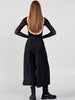 Back view of Caraclan black high-waist palazzo-culotte-pants with ultra-light material, modern wide-leg shape and clean fit