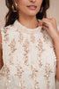 Close-up of Choklate Paris beige sequin top with elegant sparkle detail, sleeveless turtleneck design and soft evening styling.