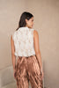 Back view of Choklate Paris beige  sleeveless sequin turtleneck top, elegant sparkle design for evening styling from VVC SHOP Sitia.