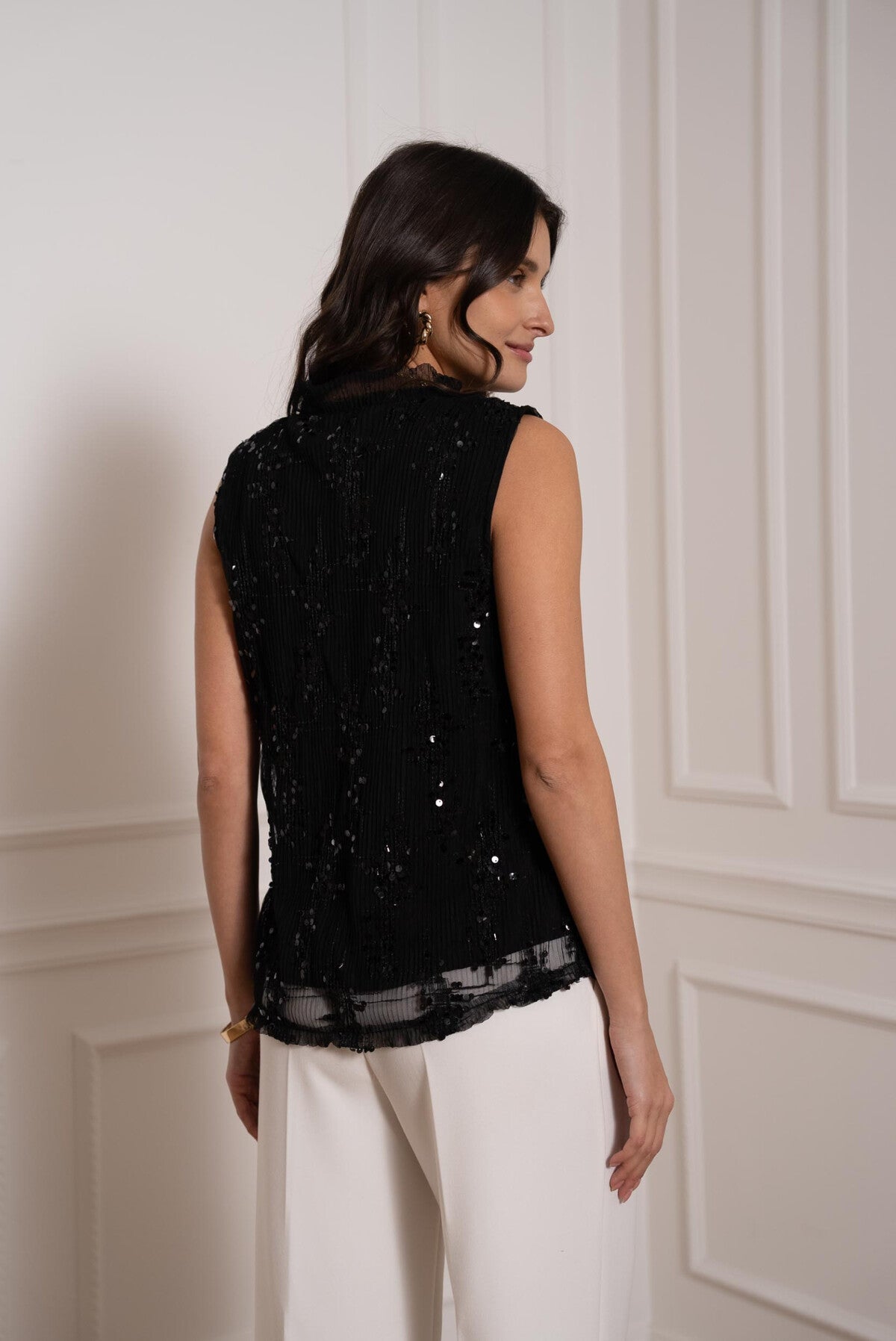 Back view of Choklate Paris black sleeveless sequin turtleneck top, elegant sparkle design for evening styling from VVC SHOP Sitia.