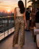 Back view of Choklate PARIS leopard print pants with elastic waist, wide-leg fit and lightweight silk-touch fabric