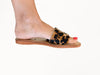 close-up side view of handmade cowhide leather sandals with brown leopard print