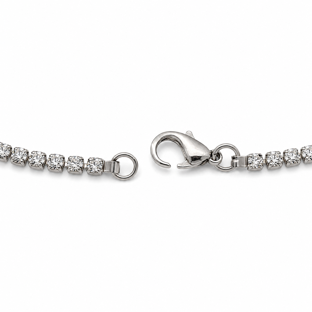 Close-up of the open silver-tone lobster clasp on a diamond-white rhinestone choker necklace by VVC Shop Sitia.