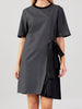 close up front view of gray-black asymmetrical pleated midi dress with rivet sleeves by Say available in Sitia