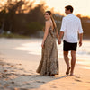 Full-length leopard maxi dress swaying by the sea in Crete