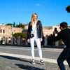 Side view of the Gala black quilted travel blazer showing its diamond quilting and fitted waist in Sitia, Crete.