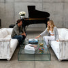 Golden brass bowl styled as a luxury coffee table centerpiece in a modern living room interior