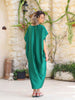 Side view of a green plus-size maxi kaftan showing the airy silhouette and longer mullet hem, available at VVC SHOP Sitia, Crete