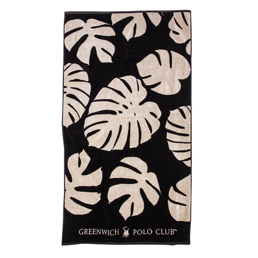 Greenwich Polo Club 3773 black cotton beach towel with beige tropical leaf pattern, 90 × 180 cm, shown flat.