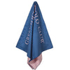 Greenwich Polo Club 5210 blue and pink microfiber beach towel hanging from its elastic roll-up loop.