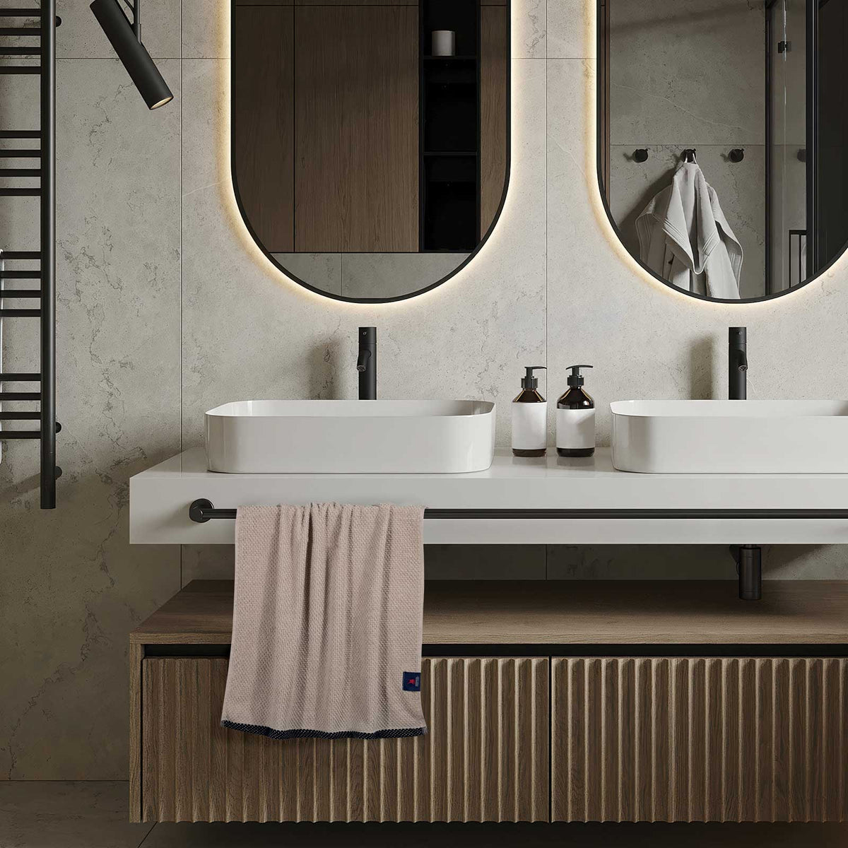 Beige Greenwich Polo Club Cozy 4130 cotton towel hanging in a modern bathroom, featuring a textured weave, black decorative border and discreet Greenwich Polo Club logo for a timeless unisex look.