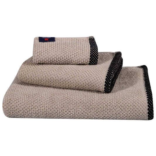 Close-up detail of Greenwich Polo Club Cozy 4130 towel showing premium 480 gsm cotton texture, elegant beige colour, black decorative trim and signature logo label designed for everyday luxury and durability.