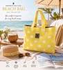 Greenwich Polo Club Essential Jacquard beach bag in yellow with large woven dots displayed on a beach in Sitia Crete, washable cotton tote bag.