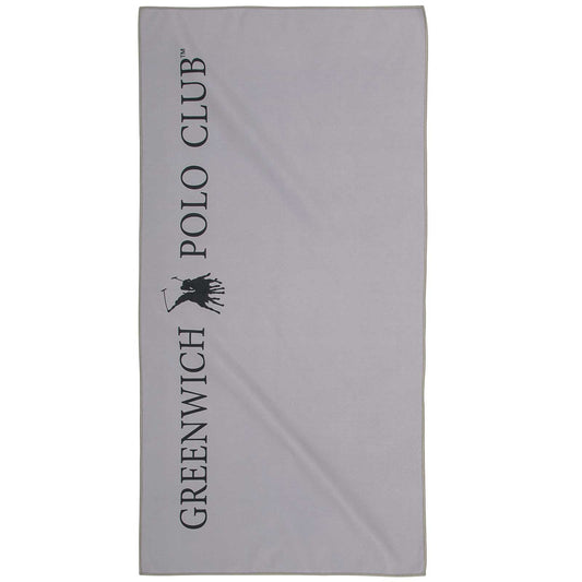 Greenwich Polo Club 267459004184 gray microfiber gym towel 4184, 45x90 cm, displayed on a workout bench with a tattooed male fitness model in the gym, available at VVC SHOP Sitia, Crete.