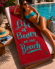 Luxury Greenwich Polo Club beach towel 3640 in red and turquoise with LIFE IS BETTER AT THE BEACH slogan at luxury pool resort in Crete