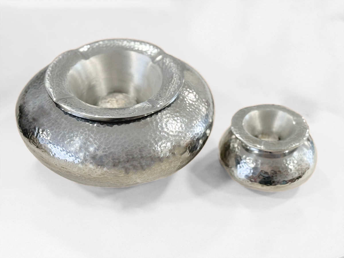 Large hammered aluminium ashtray shown with its removable windproof lid on a white background.