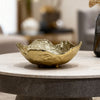 Golden handmade brass bowl with organic texture styled as elegant table decor from viktoria-vigh.com
