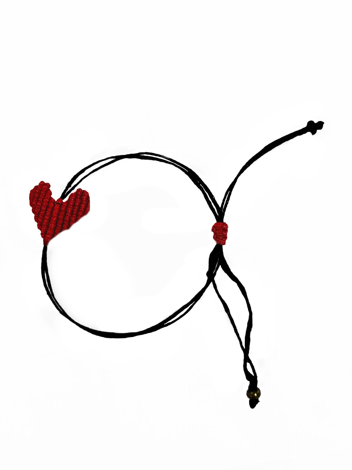 Flat lay of an braded macrame red heart charm and adjustable black cord.