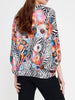 Back view of Imza loose fit zebra floral summer blouse with colourful poppy print, airy batwing sleeves and relaxed hot weather fit